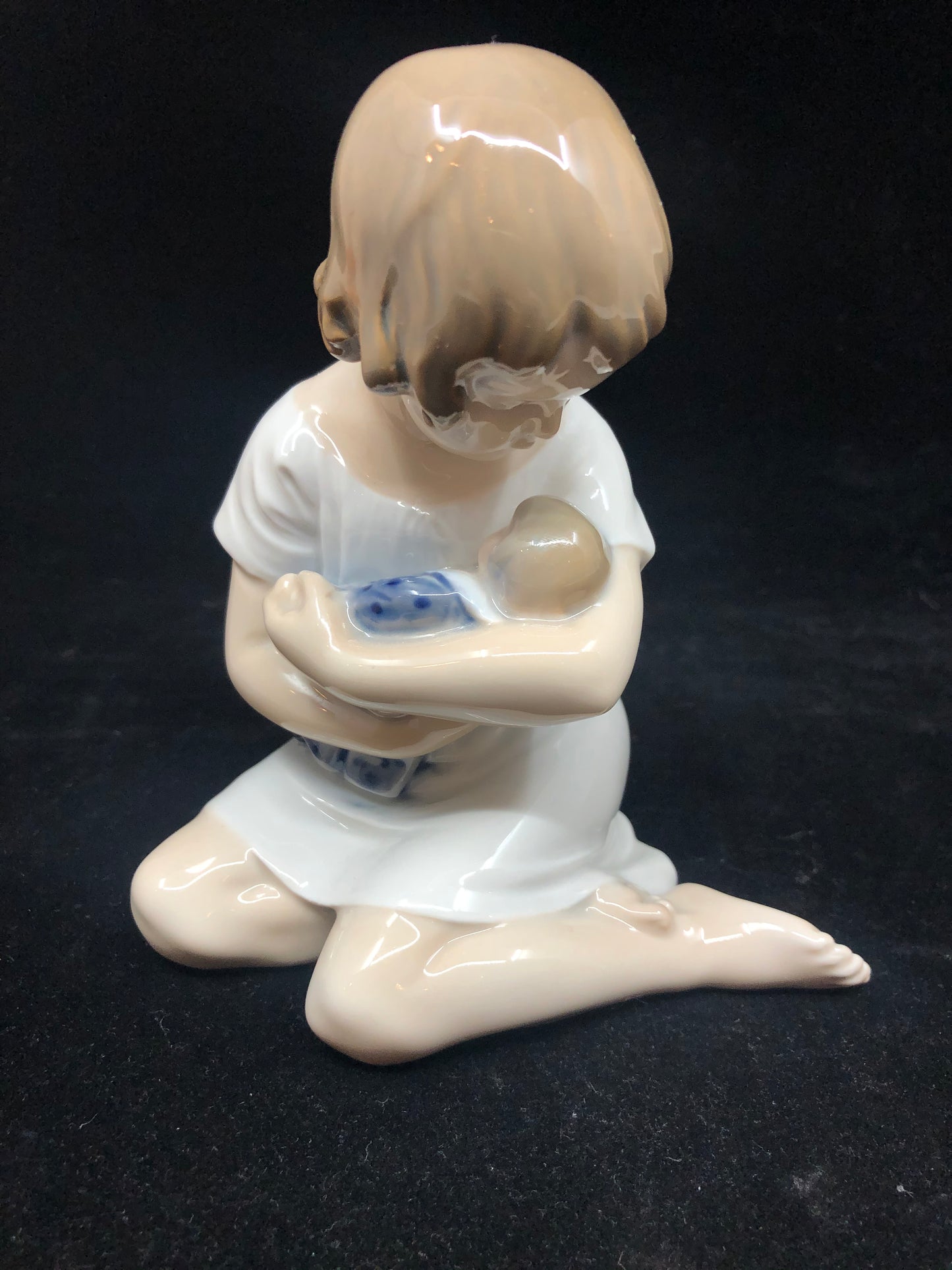 Royal Copenhagen Girl Holding Doll, #1938 (19542)