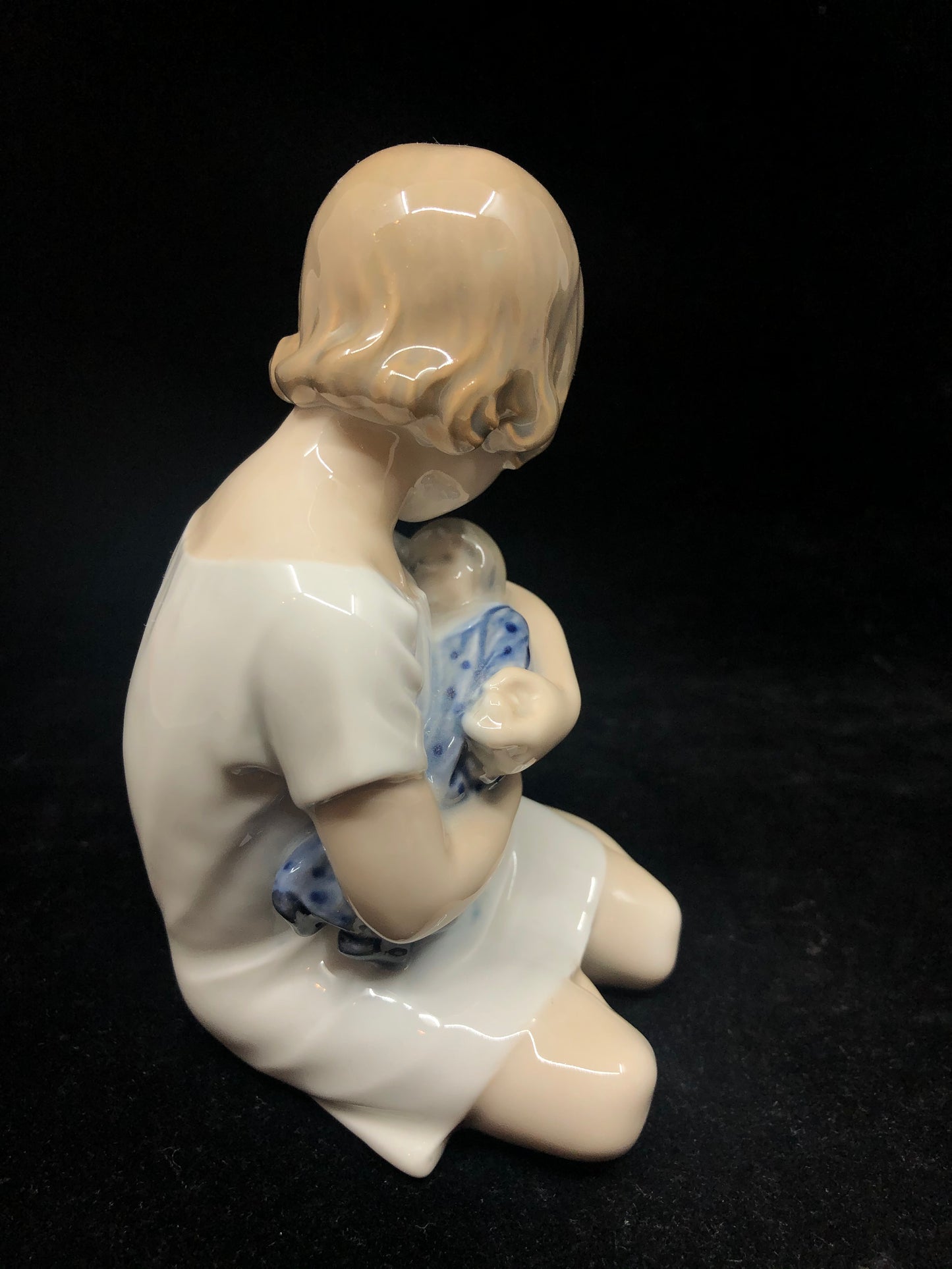 Royal Copenhagen Girl Holding Doll, #1938 (19542)