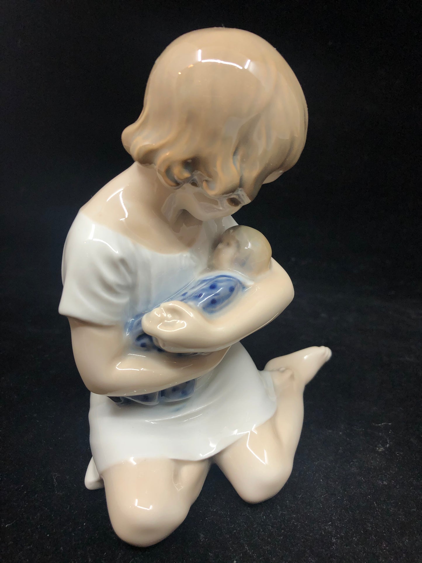 Royal Copenhagen Girl Holding Doll, #1938 (19542)