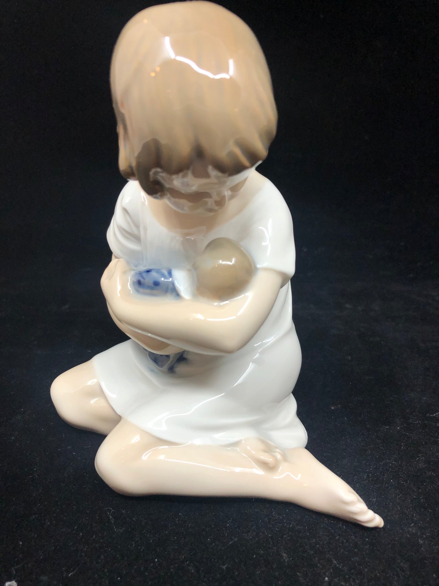 Royal Copenhagen Girl Holding Doll, #1938 (19542)