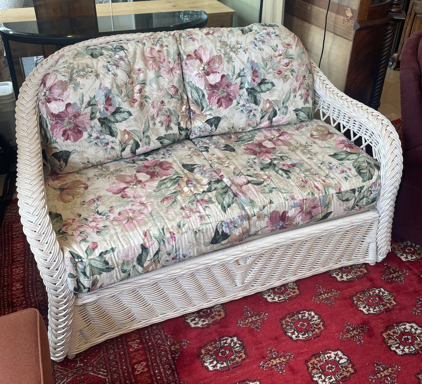 South Sea Rattan Loveseat with Floral Cushions (0FH001)