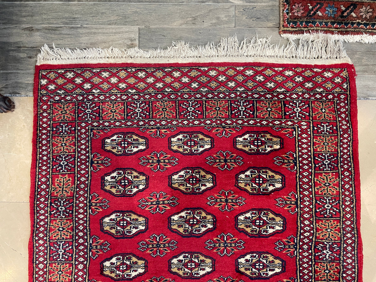 Hand Knotted Bokhara Runner in Red (11'3x3'1) (0PO002)